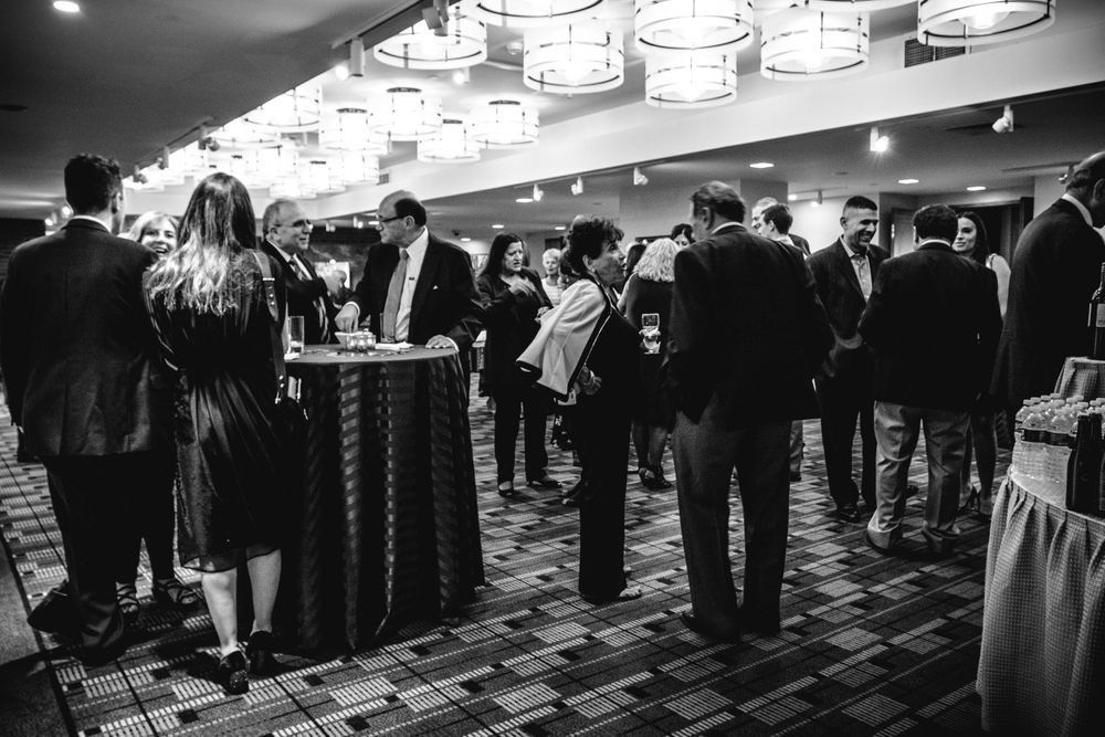 Guests networking at a corporate reception
